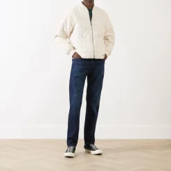 502™ Mid-Rise Tapered Jeans