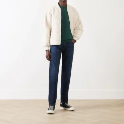 502™ Mid-Rise Tapered Jeans