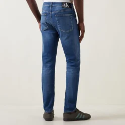 Mid Rise Slim Leg Jeans