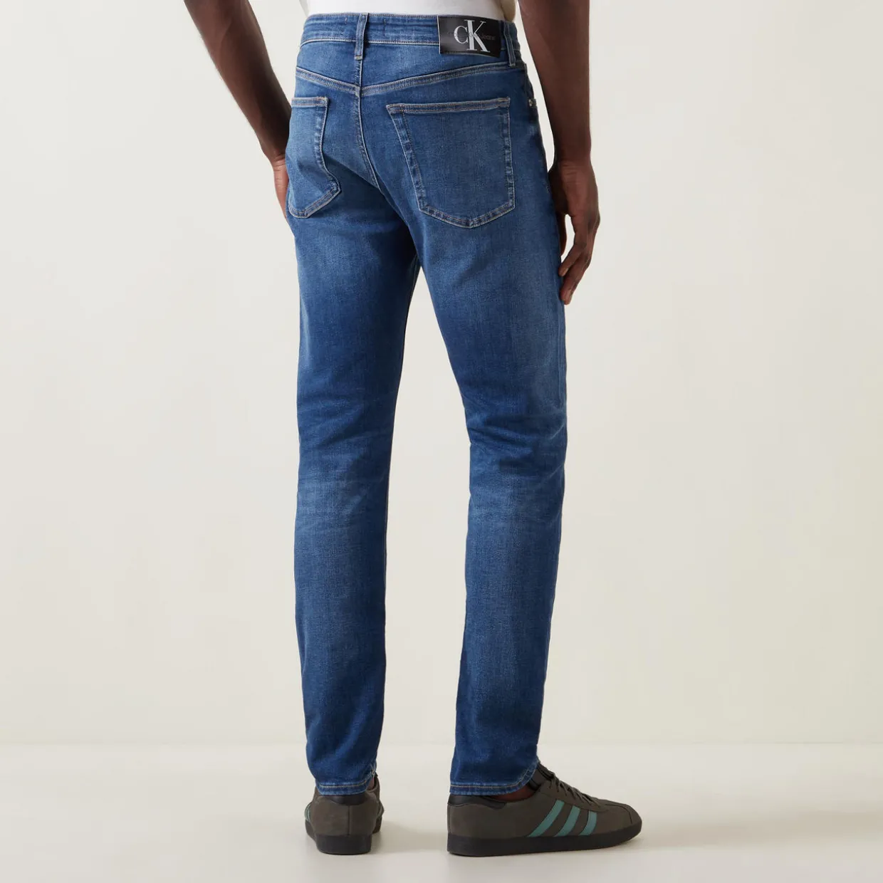 Mid Rise Slim Leg Jeans