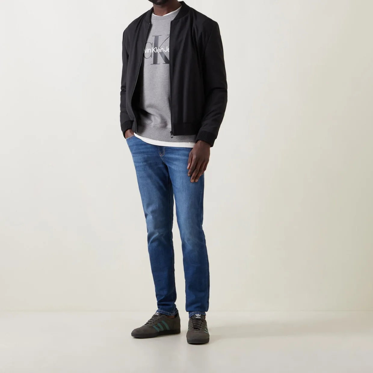 Mid Rise Slim Leg Jeans