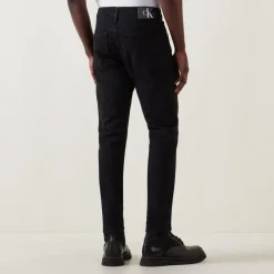 Mid Rise Slim Leg Jeans